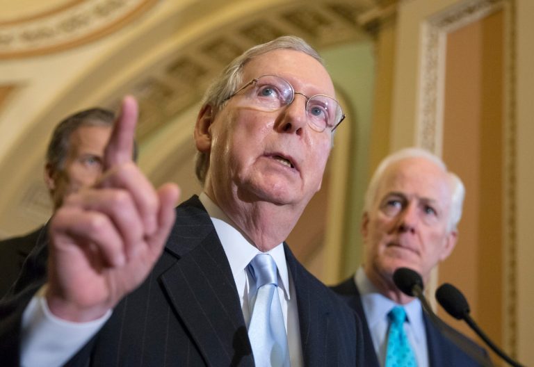 Mitch McConnell argued the clean energy taxes President Obama has unsuccessfully attempted to pass through Congress would hurt the middle class. (AP Photo)