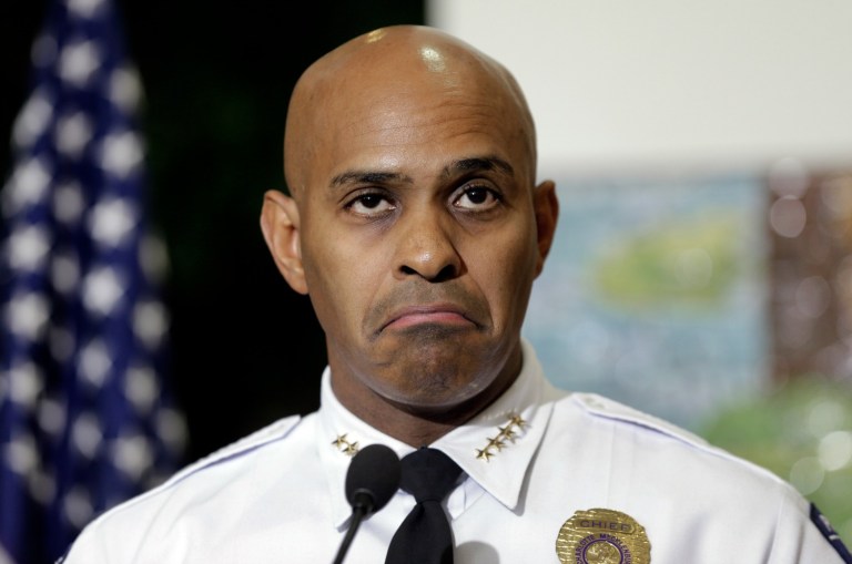 Charlotte-Mecklenburg Police chief Police Chief Kerr Putney admitted Thursday before joining the force he believed minorities were considered guilty until proven innocent and would have doubted law enforcement was being honest about the shooting of an African-American civilian. (AP Photo/Chuck Burton)