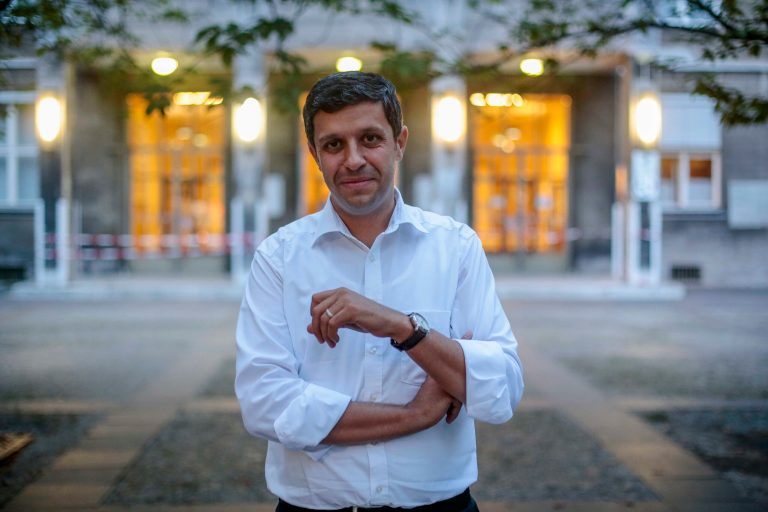 In this Monday, Sept. 29, 2014 photo, Palestinian-born Raed Saleh poses for a photo prior to an interview with The Associated Press, in Berlin. Saleh, who was born in the West Bank in 1977 and came to Berlin at age 5, is one of three candidates seeking to replace incumbent Berlin Mayor Klaus Wowereit, who is stepping down. (AP Photo/Markus Schreiber)