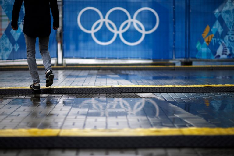 Cable protectors lie across a walkway next to the Iceberg Skating Palace at the 2014 Winter Olympics, Tuesday, Feb. 18, 2014, in Sochi, Russia. After $51 billion, it should be easy to get around at the Olympics - for everyone. Organizers have repeatedly touted accessibility for people with disabilities as one of the chief lasting benefits of hosting the Winter Games in Sochi. But with less than three weeks until the Paralympics, infrastructure around Olympic Park and its venues are not entirely barrier-free. (AP Photo/David Goldman)