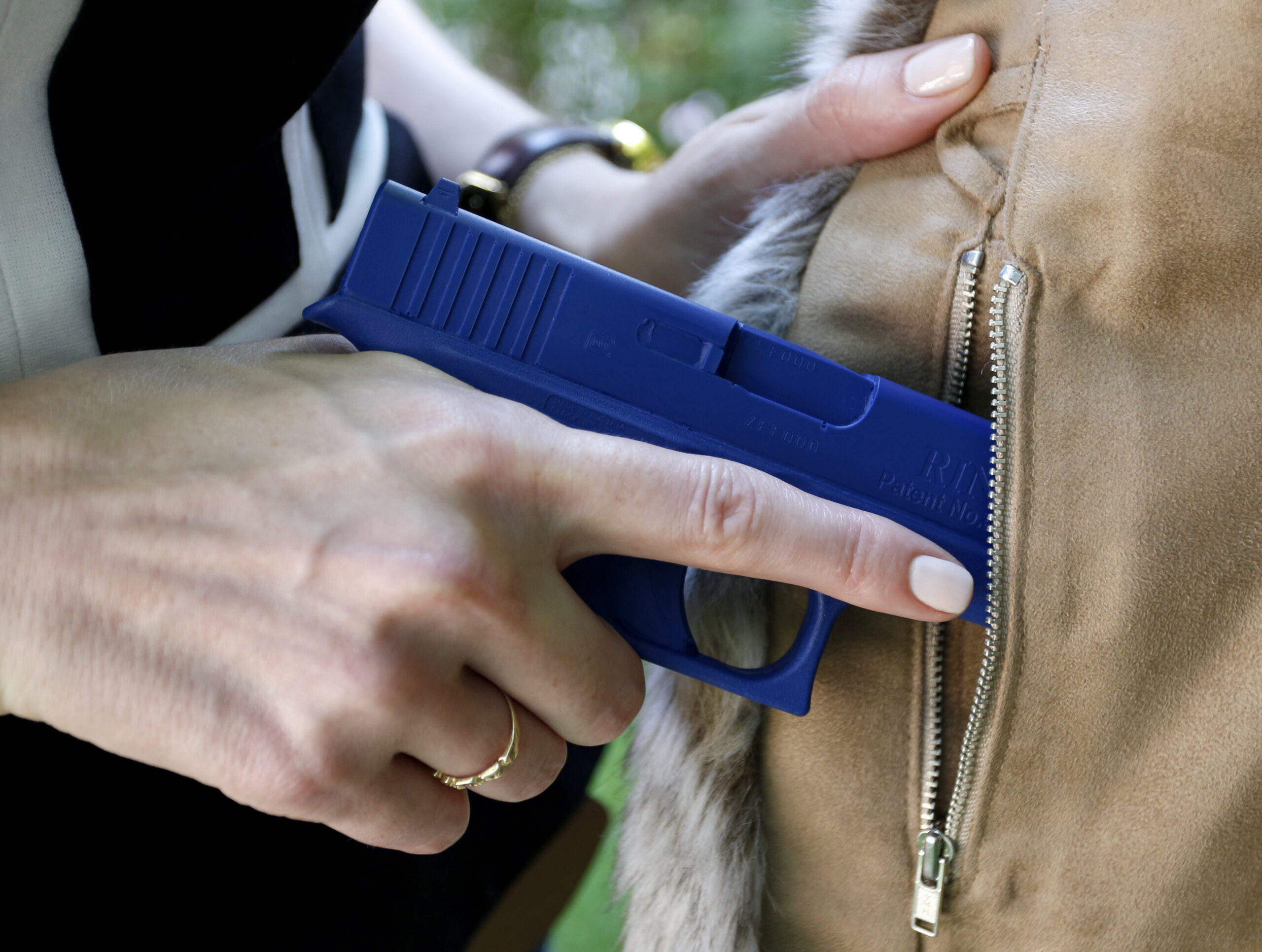 Concealed gun permits surge over 15 million, fight on for more