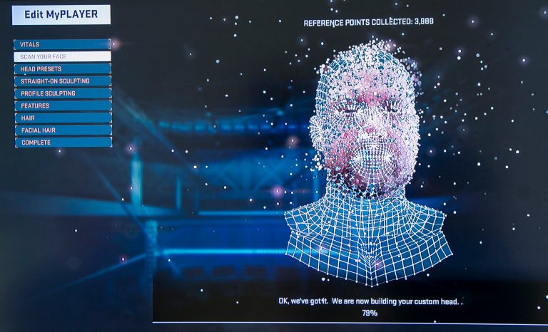 In this photo taken Tuesday, Sept. 16, 2014, a video monitor displays a 2K Sports'  3D face-capturing technology processing a scanned face in real-time, with the help of a stereoscopic camera attached to a Sony PS4 video console, to build a realistic 3D model of the user's face to be included in the video game, in Los Angeles. The NBA 2k15 upcoming basketball simulation video game developed by Visual Concepts and published by 2K Sports releases Oct. 7, 2014. (AP Photo/Damian Dovarganes)