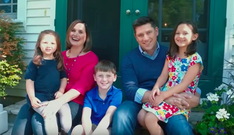 Unless the candidate has been lying to his wife for the last fourteen years, the conversion seems legitimate. (Nicholson for Senate/YouTube)