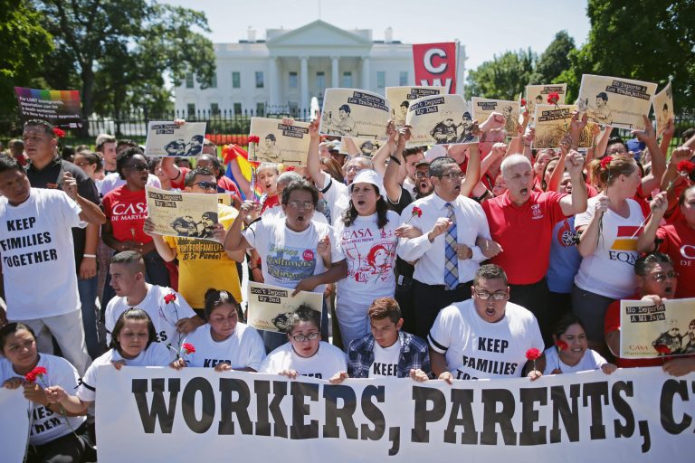 August 28: More than 300 demonstrators marched from the Immigration and Customs Enforcement headquarters to rally outside the White House and demand that President Barack Obama halt deportations. (Photo by Chip Somodevilla/Getty images)