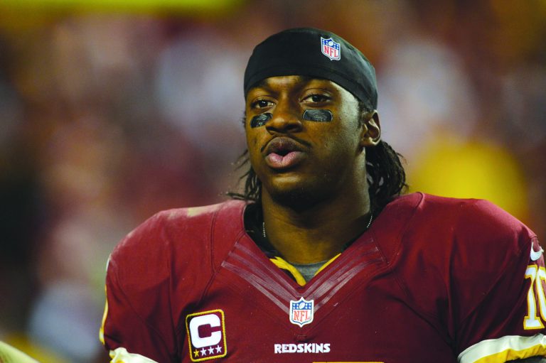 Patrick McDermott/Getty Images
The Redskins' Robert Griffin III was named the AP offensive rookie of the year by a wide margin Saturday.