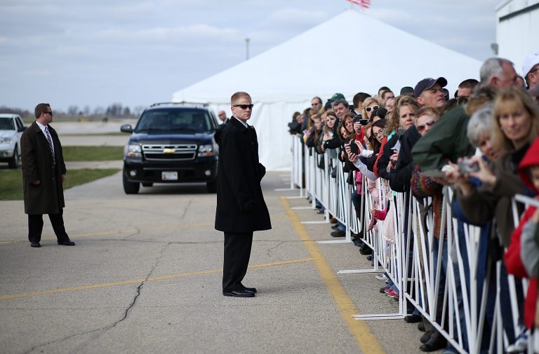 Secret Service agents monitor the crowd on Nov. 3, 2012, during one of Romney's campaign stops. (Getty images/Justin Sullivan)
