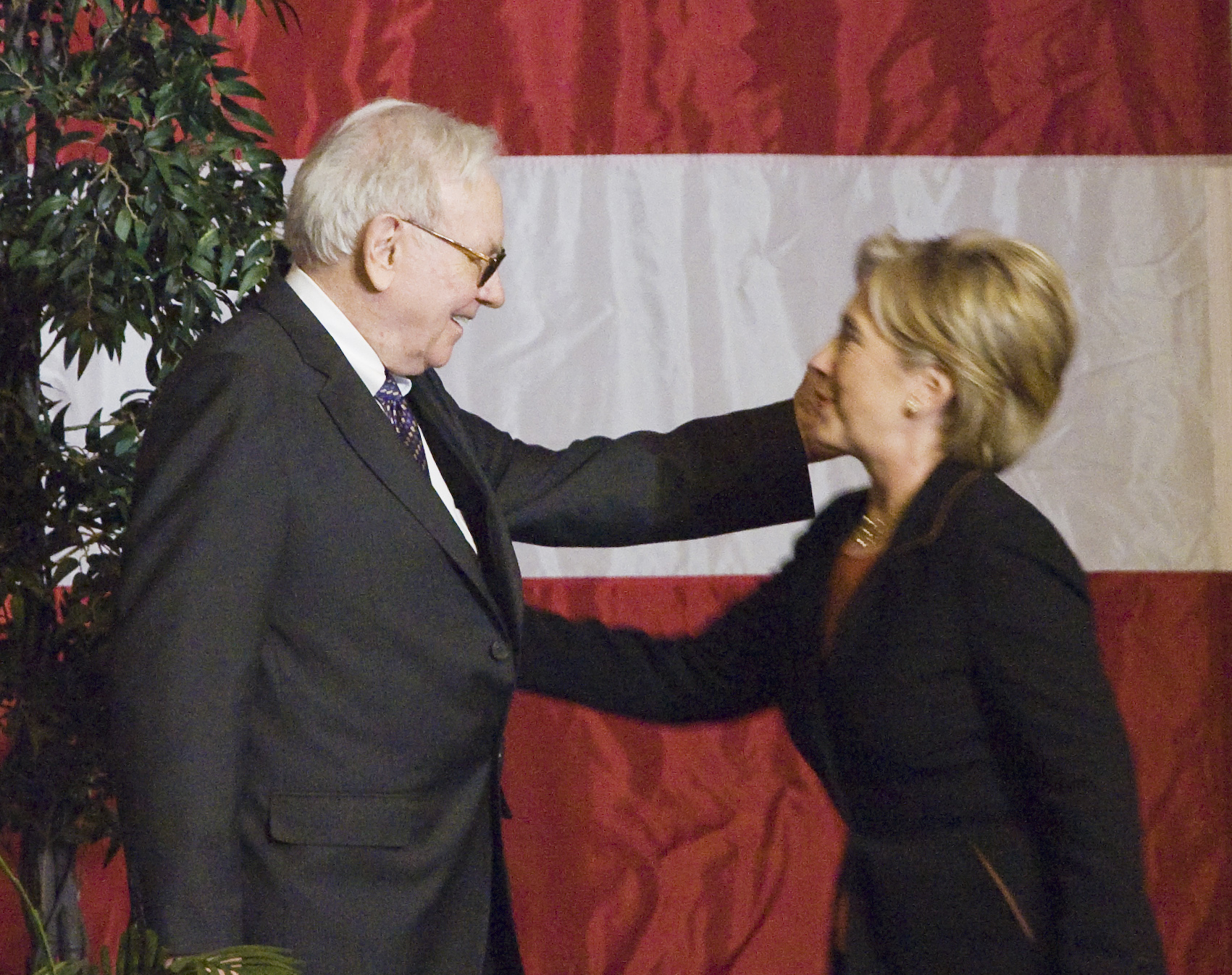 Clinton, Warren Buffett split on corporations fleeing U.S. taxes