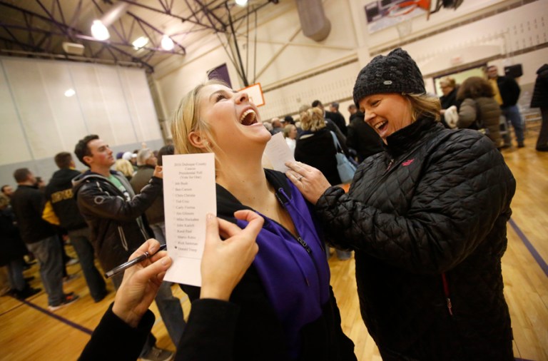 Significantly more women than men voted in the Democratic caucus, while the sexes voted pretty evenly in the Republican caucus, according to CBS News. (Mike Burley/Telegraph Herald via AP)