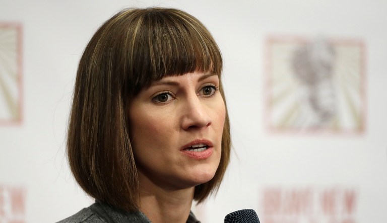 Rachel Crooks, who is running as a Democrat for the Ohio House of Representatives, is calling for the release of video footage from Trump Tower that will allegedly show an encounter in which Donald Trump forcibly kissed her in 2006. Crooks was responding to tweets from the president earlier Tuesday in which Trump accused her of fabricating the incident. (AP Photo/Mark Lennihan, File)