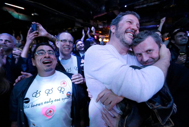 Partygoers react at an Election Night party in Baltimore after voters passed a referendum approving same sex marriage in Maryland. (AP Photo)