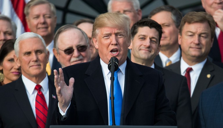 President Trump rebuked the media on Wednesday for dismissing the GOP tax bill, and he was backed up then by several companies that said they would hire, invest and give bonuses out to their workers. (AP Photo/Carolyn Kaster)