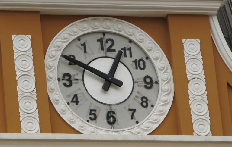 Bolivia rebels at rightist timepieces, flips clock
