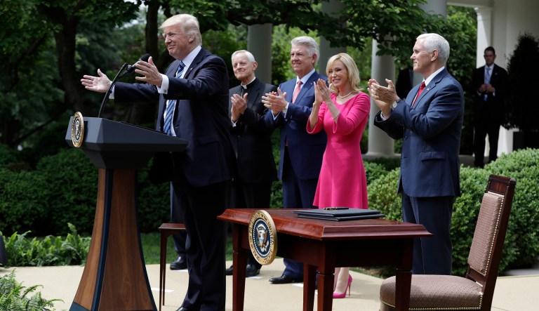 President Trump speaks in the Rose Garden before signing an executive order aimed at easing an IRS rule limiting political activity for churches. (AP Photo/Evan Vucci)