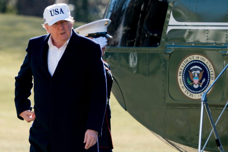 President Donald Trump steps off Marine One on the South Lawn as he arrives at the White House in Washington, Sunday, Jan. 7, 2018, after traveling from Camp David, Md. (AP Photo/Andrew Harnik)