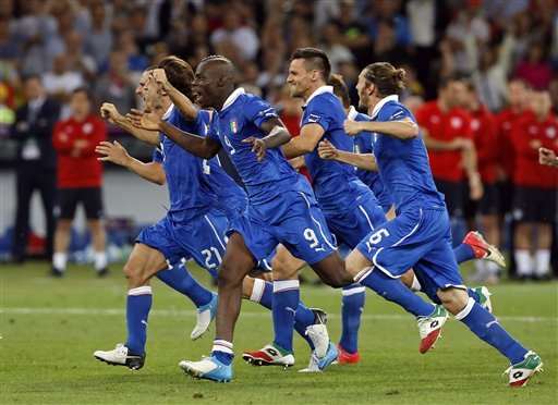 Italian players celebrate after winning the penalty shootout during the Euro 2012 soccer championship quarterfinal match between England and Italy in Kiev, Ukraine, Monday, June 25, 2012. (AP Photo/Kirsty Wigglesworth)