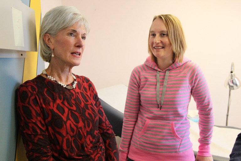 Health and Human Services Secretary Kathleen Sebelius, left, speaks with Noelle Stordock of Milwaukee, Friday, Nov. 15, 2013. Stordock successfully signed up at the Progressive Community Health Center in Milwaukee,where Sebelius was touring, for insurance under the Affordable Care Act. (AP Photo/Milwaukee Journal Sentinel, Michael Sears)