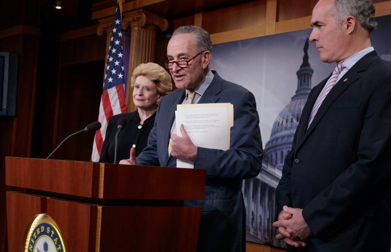 Republicans are ripping Democrats up for reelection over the budget shutdown. Among those targeted and seen with Senate Minority Leader Charles Schumer are Sen. Debbie Stabenow, D-Mich., left, and Sen. Bob Casey, D-Pa. (AP Photo/J. Scott Applewhite)