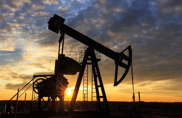 Higher oil prices will prompt output to climb 100,000 barrels more than previously forecast, agency says. (PRNewsFoto/Redhawk Investment Group, LLC, Shutterstock)