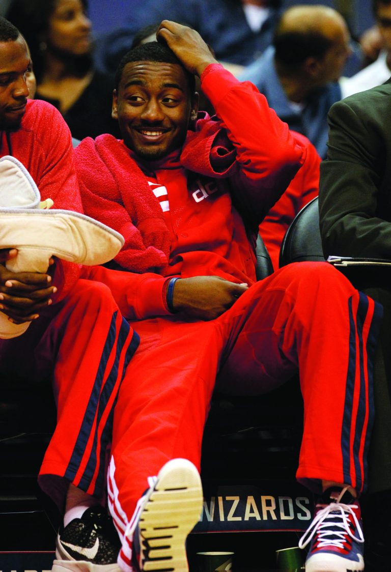 Ann Heisenfelt/AP
Point guard John Wall, who averaged 16.3 points a year ago, has missed 10 weeks already with a stress injury in his left patella.