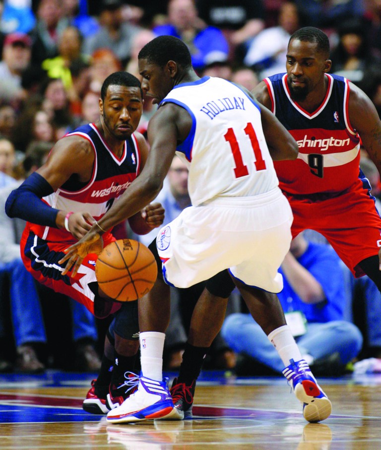 H. Rumph Jr/AP
John Wall had nine points, six assists and five turnovers as the Wizards lost on the road to the 76ers on Wednesday night.