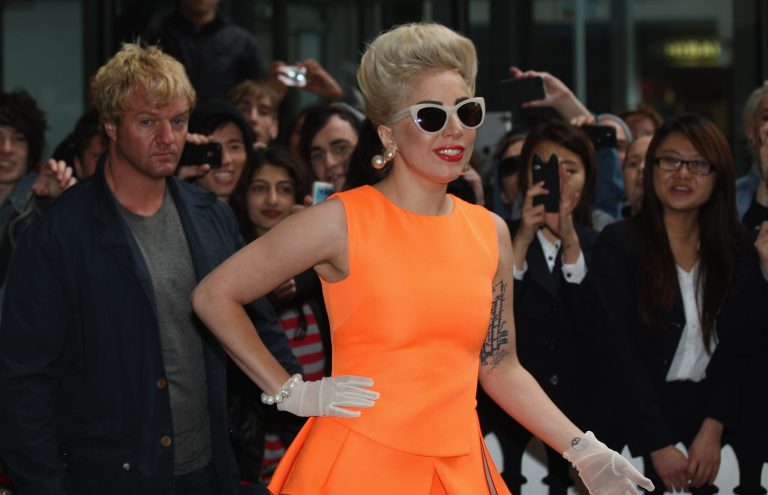 AUCKLAND, NEW ZEALAND - JUNE 05:  American singer Lady Gaga, greets fans as she arrives at the Stamford Plaza on June 5, 2012 in Auckland, New Zealand.  (Photo by Sandra Mu/Getty Images)
