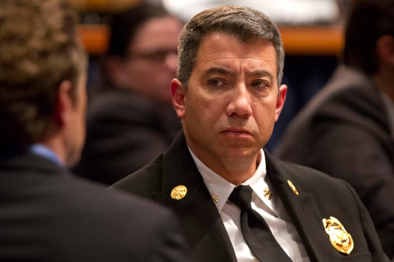 San Francisco Fire Department Assistant Deputy Chief Dale Carnes attends a National Transportation Safety Board (NTSB) investigative hearing in Washington, Wednesday, Dec. 11, 2013, on the crash landing of Asiana Airlines Flight 214. The two-dozen witnesses at the hearing include representatives of Asiana, Boeing Co., the Federal Aviation Administration and the Korean government Office of Civil Aviation. (AP Photo/Jacquelyn Martin)