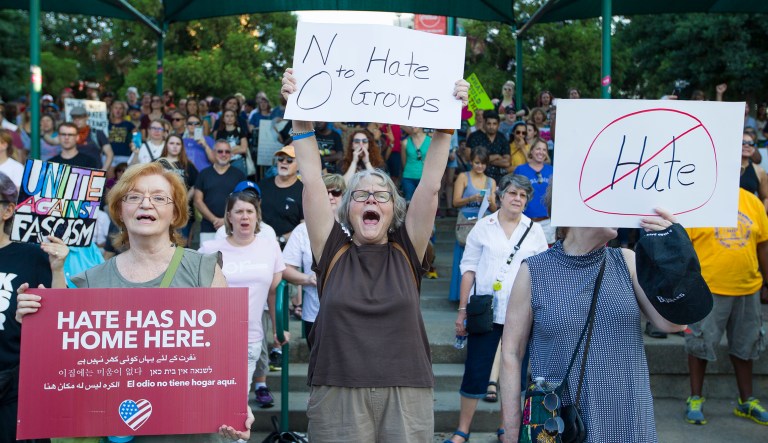 Anti-racism demonstrators participate in a rally that started in Centennial Olympic Park in Atlanta on Saturday, Aug. 19, 2017. Protests took place across the country to denounce white supremacists in the wake of the fatal car attack a week earlier in Charlottesville, Va. (AP Photo/Todd Kirkland)