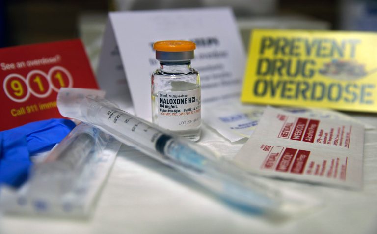 A kit with naloxone, also known by its brand name Narcan, is displayed at the South Jersey AIDS Alliance in Atlantic City, N.J. on Wednesday, Feb. 19, 2014. An overdose of opiates essentially makes the body forget to breathe. Naloxone works by blocking the brain receptors that opiates latch onto and helping the body 