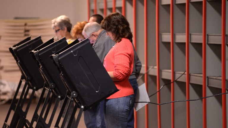 Residents cast their votes at Vernon Park Mall in Kinston, N.C., on Thursday, Oct. 23, 2014, the first day of early voting in the state. (AP/Zach Frailey)