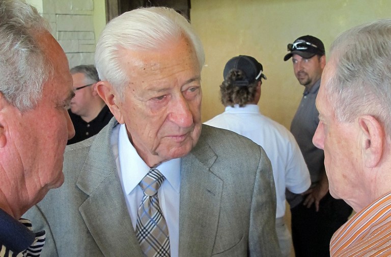 FILE - In this April 11, 2014, file photo, U.S. Rep. Ralph Hall mingles with fellow military veterans at a weekly 