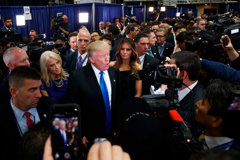 President-elect Trump speaks with reporters. The New York Times announced the formation of a new investigative unit to cover the federal government. (AP Photo/ Evan Vucci)