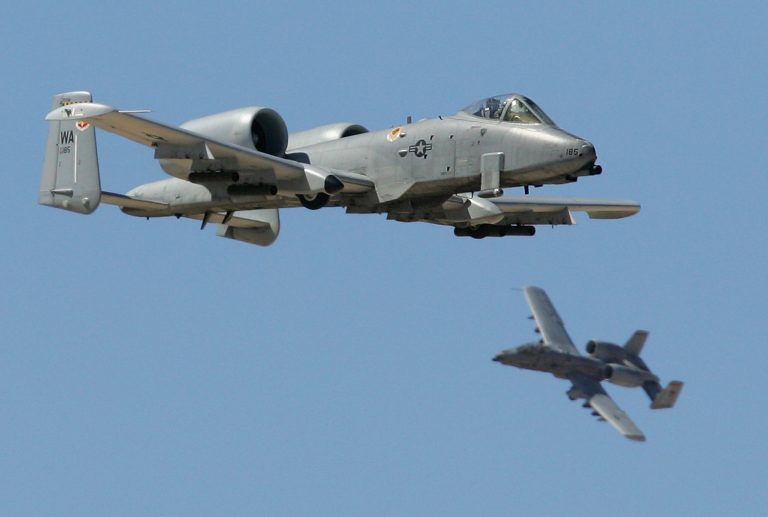 A pair of A-10 Thunderbolts fly by during a U.S. Air Force firepower demonstration at the Nevada Test and Training Range September 14, 2007 near Indian Springs, Nevada. (Photo by Ethan Miller/Getty Images)
