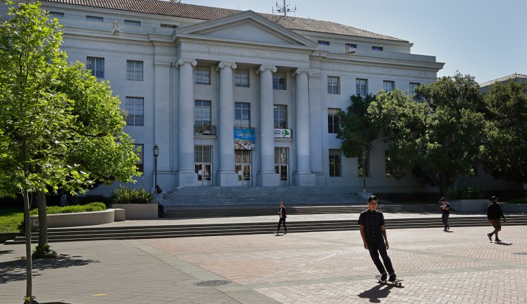 The current proposal only applies to public streets and would allow private businesses to refuse service to those not wearing shoes or shirts. (AP Photo/Ben Margot)