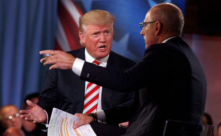 Republican presidential nominee Donald Trump defended a three-year-old tweet criticizing the integration of women into the United States military. (AP Photo/Evan Vucci)