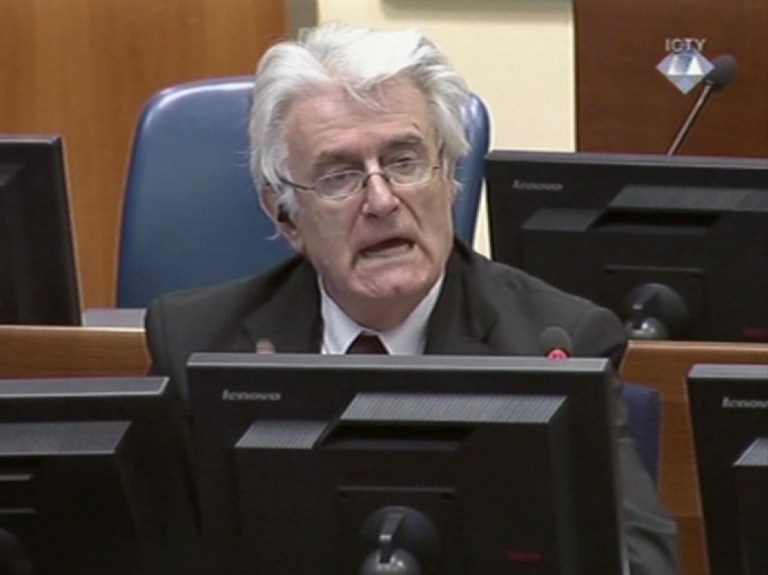 Former Bosnian Serb leader Radovan Karadzic addresses the court of the International Criminal Tribunal for the former Yugoslavia in The Hague Netherlands in this image taken from TV, Wednesday Oct. 1, 2014. Karadzic insisted Wednesday that United Nations prosecutors do not have 