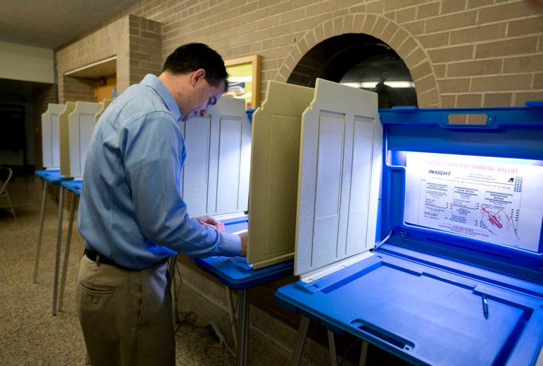   Wisconsin Republican Gov. Scott Walker votes Tuesday, June 5, 2012, in Wauwatosa, Wis. Walker faces Democratic challenger Tom Barrett in a special recall election. (AP Photo/Morry Gash)  
