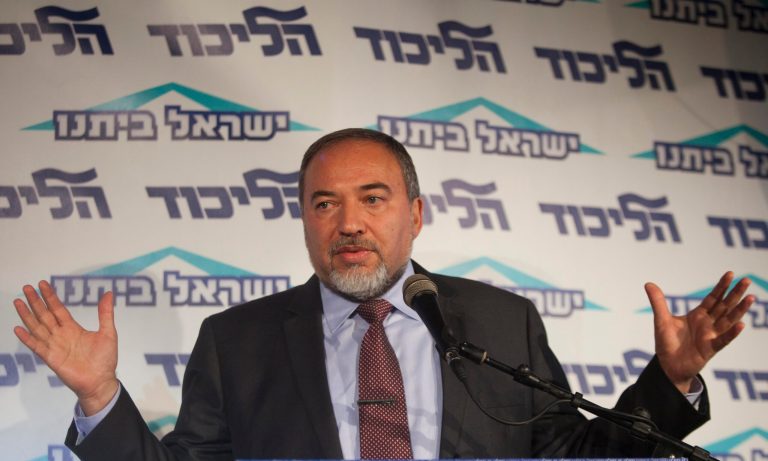   FILE - in this Thursday, Dec. 13, 2012 file photo, Israeli Foreign Minister Avigdor Lieberman speaks to the media during an event of his political party in Tel Aviv, Israel, on Friday, Dec. 14, 2012 Lieberman has announced he is resigning a day after an indictment for breach of trust was filed against him by the country's attorney general. (AP Photo/Dan Balilty, File)  