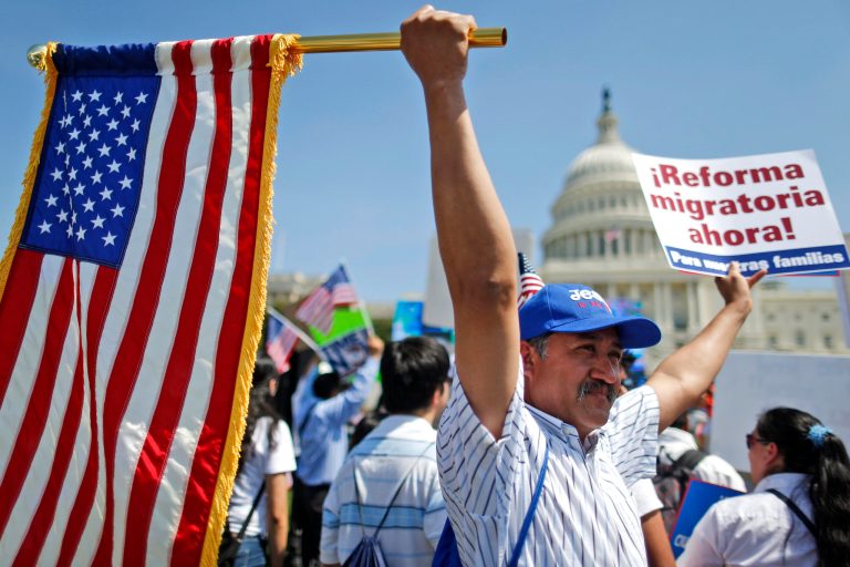 Rigoberto Ramos from Seaford, Del., originally from Guatemala, rallies for immigration reform in front of the U.S. Capitol in Washington, Wednesday, April 10, 2013. (AP Photo/Charles Dharapak)