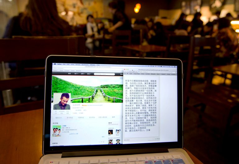 A page from Chinese actor Wen Zhang's Sina Weibo account showing an apology statement to his wife and children posted by him is displayed on a computer screen at a cafe in Beijing, China Wednesday, April 2, 2014. The Chinese actor's apology to his actress wife following rumors of his infidelity has set a record for comments and retweets on China's version of Twitter. (AP Photo/Andy Wong)