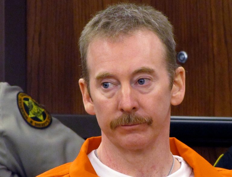   FILE - In this Oct. 14, 2011, file photo Eric Robert appears during a hearing in Sioux Falls, S.D. Robert pleaded guilty to killing Ron Johnson during a botched prison escape at the South Dakota State Penitentiary and asked to be put to death. A judge determined in October that the crime merited the death sentence, and Robert was scheduled for execution the week of May 13 but the state Supreme Court postponed the date in February to allow more time for a mandatory review to make sure the death penalty was proper, even though Robert hadn't appealed the conviction or sentence. The review could take up to two years. (AP Photo/Argus Leader, Emily Spartz, File)  