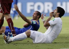 FIFA bans Suarez for 4 months for biting opponent