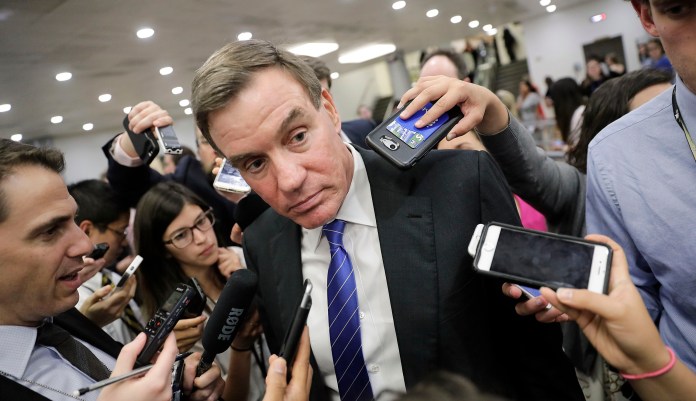 "We have no whole of government approach on how we're going to deal with this problem," said Senate Intelligence Committee Vice Chairman Mark Warner, D-Va. (AP Photo/J. Scott Applewhite)