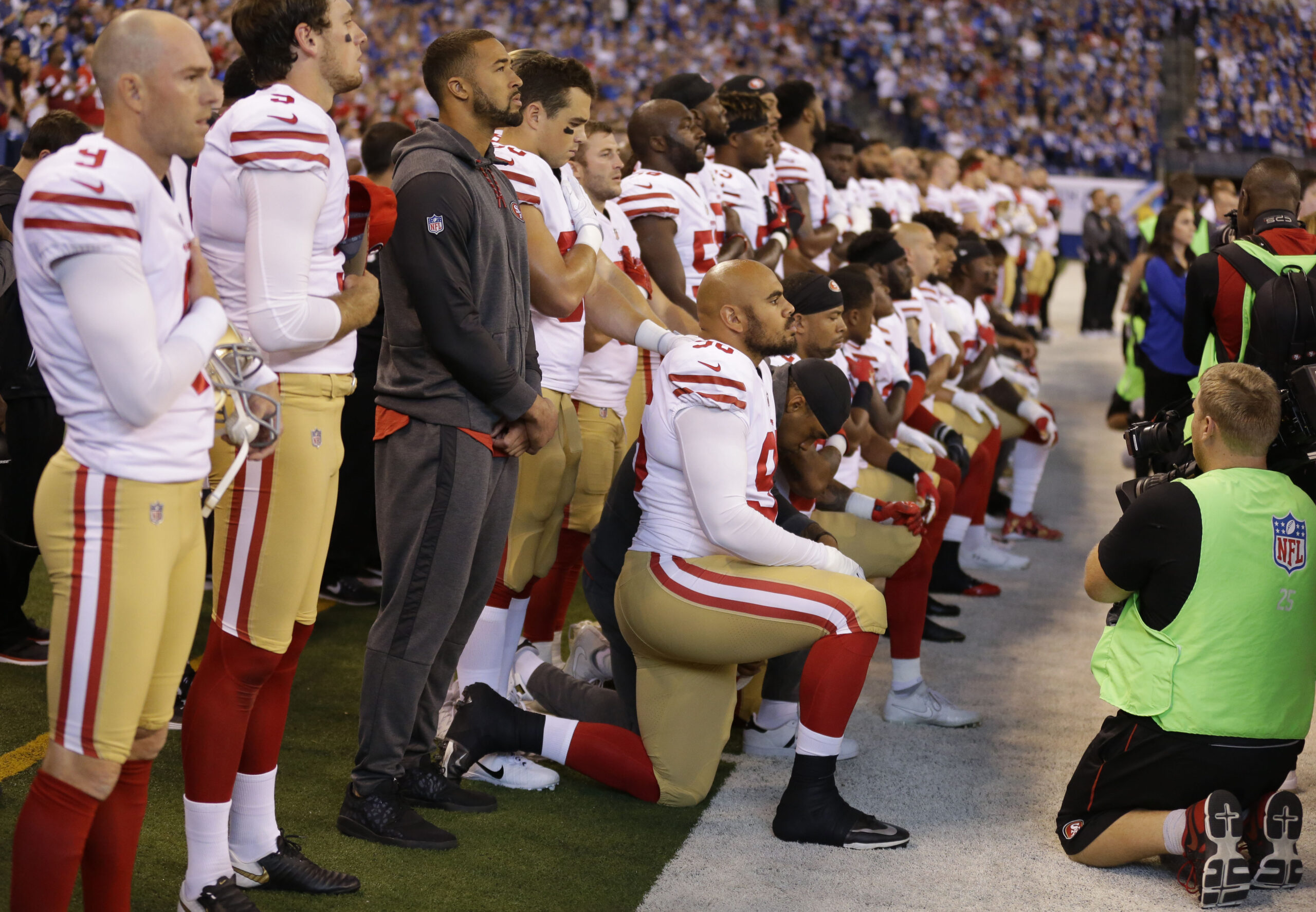 NFL pushes back on reports that it will force players to stand during national anthem