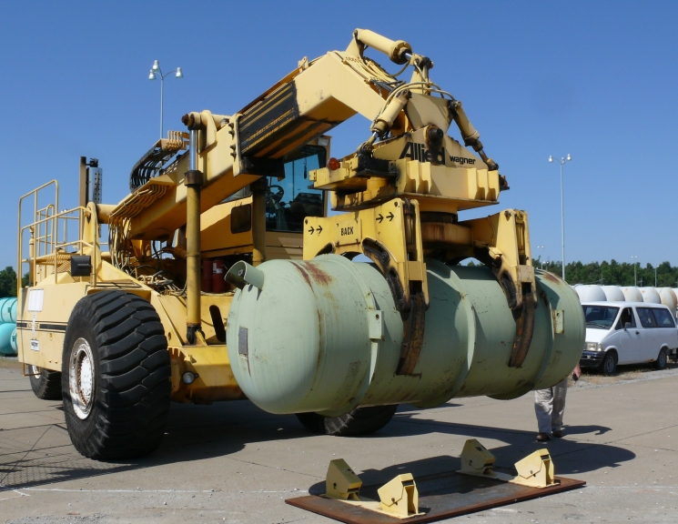 This cylinder hauler at Paducah's Babcock & Wilcox Conversion Services plant delivers the first of DOE's 14-ton depleted uranium cylinders to USEC for re-enrichment as part of a five-party agreement that is extending enrichment operations at the 60-year-old plant for another year, delaying increased costs at the site for DOE. 