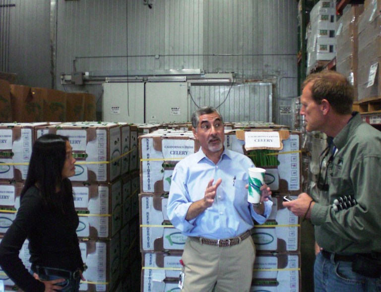   This August 2011 photo released by Civic Ventures shows, from left, Leslye Louie, Pat Guerra, and Lyle Hurst, discuss Pat's Fresh Produce project at the Second Harvest Food Bank of Santa Clara County, in San Jose, Calif. At the time all were alumni or current Encore Fellows, a program that helps match baby boomers and others looking to change careers with nonprofits. (AP Photo/Civic Ventures, Brett Hurst)  