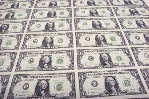 The Federal Reserve is not likely to replace the dollar bill any time soon. (Photo: Thinkstock)
