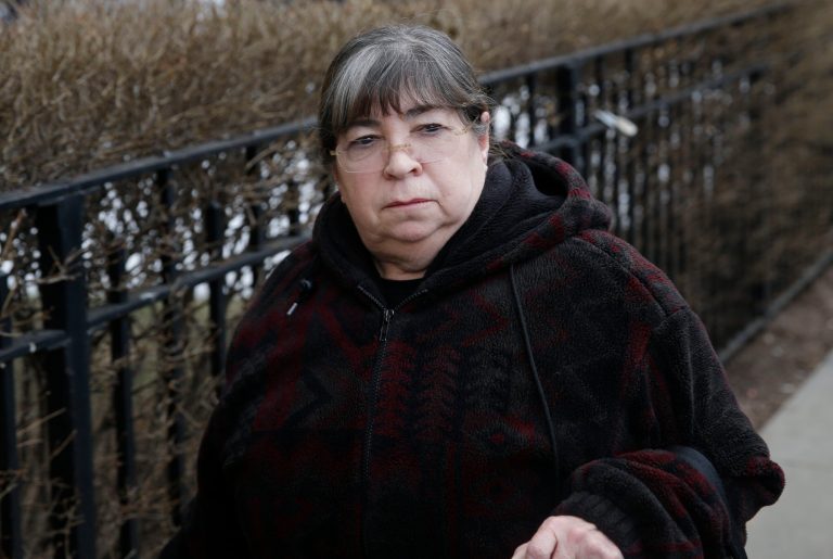 Annette Bongiorno leaves federal court in New York, Monday, Feb. 24, 2014.  Bernard Madoff's longtime secretary says she was in the dark about her boss' epic Ponzi scheme. (AP Photo/Seth Wenig)
