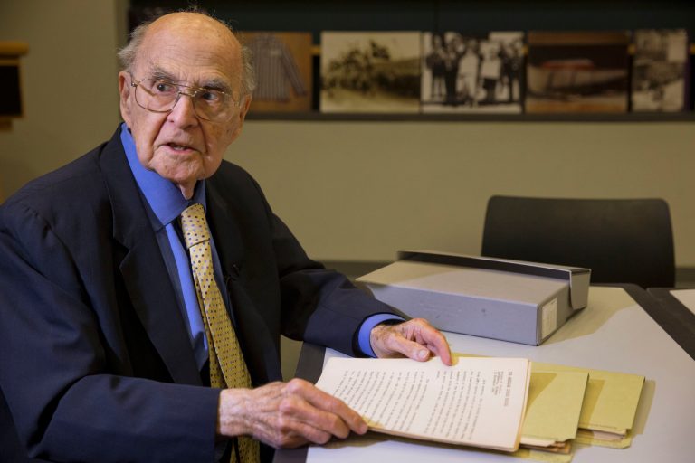 Harold Burson, 92, donates a never-before-published transcript of coverage of the Nuremberg trials to the U.S. Holocaust Memorial Museum in Washington on Tuesday Nov. 19, 2013. The never-before-published transcript of coverage of the Nuremburg trial after the Holocaust is being donated to the U.S. Holocaust Memorial Museum by Burson who covered the trial for the American Forces (radio) Network. (AP Photo/Jacquelyn Martin)
