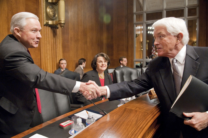 Sen. Jeff Sessions, left, greets Tom Donohue, president and CEO of the U.S. Chamber of Commerce, as Sen. Dianne Feinstein looks on. (CQ Roll Call via AP Images)
