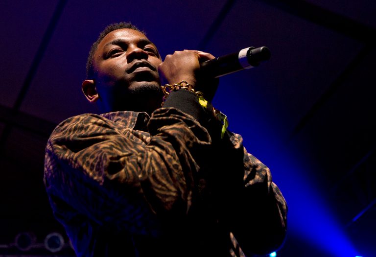   Rapper Kendrick Lamar performs at the Bonnaroo music festival in Manchester, Tenn., Thursday, June 7, 2012. (AP Photo/Dave Martin)  